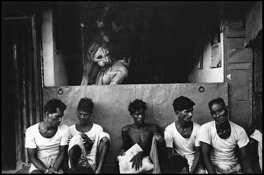 Workers resting before Durga Puja image, Calcutta, 1972