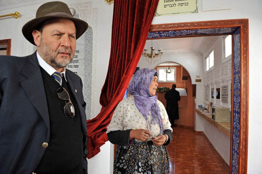 M. Jacky Kadoch and Aisha, the Berber keeper of the shrine of the great Jewish saint Rabbi David u-Moshe (16th century) with keys in hands. The shrine is visited by both Jews and Muslims, Agoïm, 2012