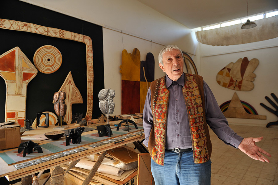 The artist Farid Belkahia stands in front of his project of urban sculptures honoring the seven protector saints of Marrakech, 2012