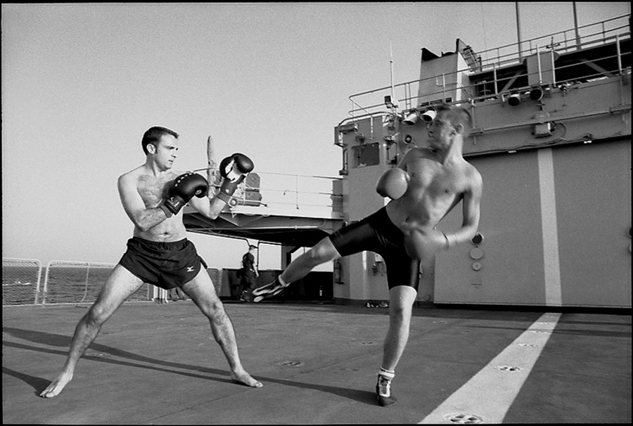 Two officers of Task Force 150 practice boxing