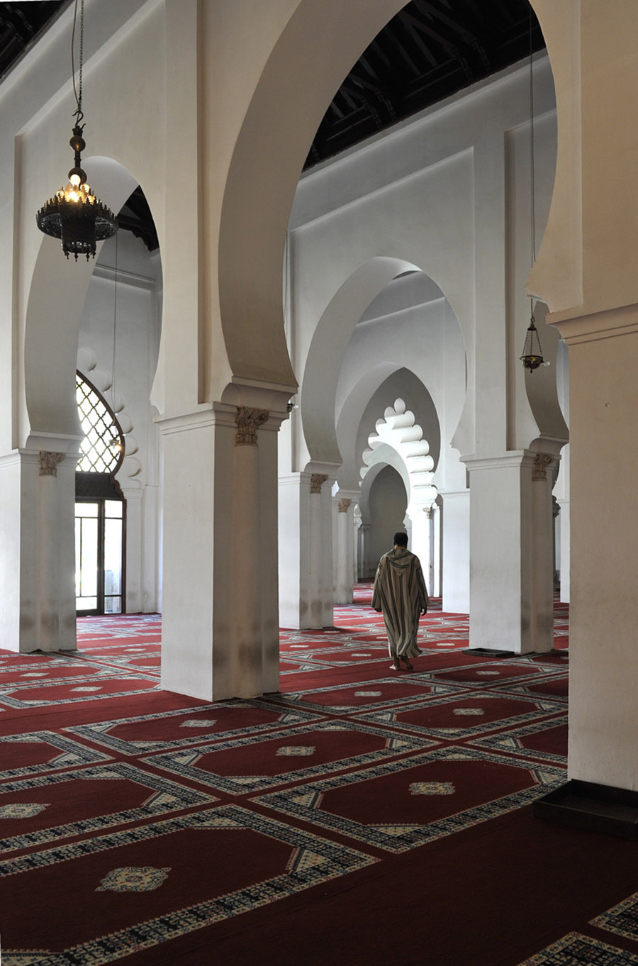 The Muezzin of the Koutoubia walking towards the minaret to issue the call to prayer, Marrakech, 2011