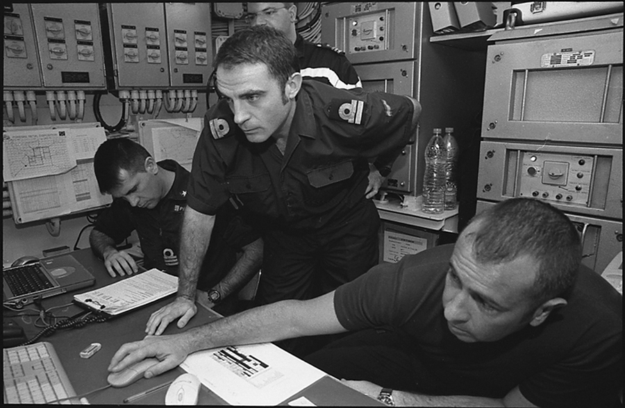 Portuguese, Italian and Spanish TF 150 officers in the telecommunications room