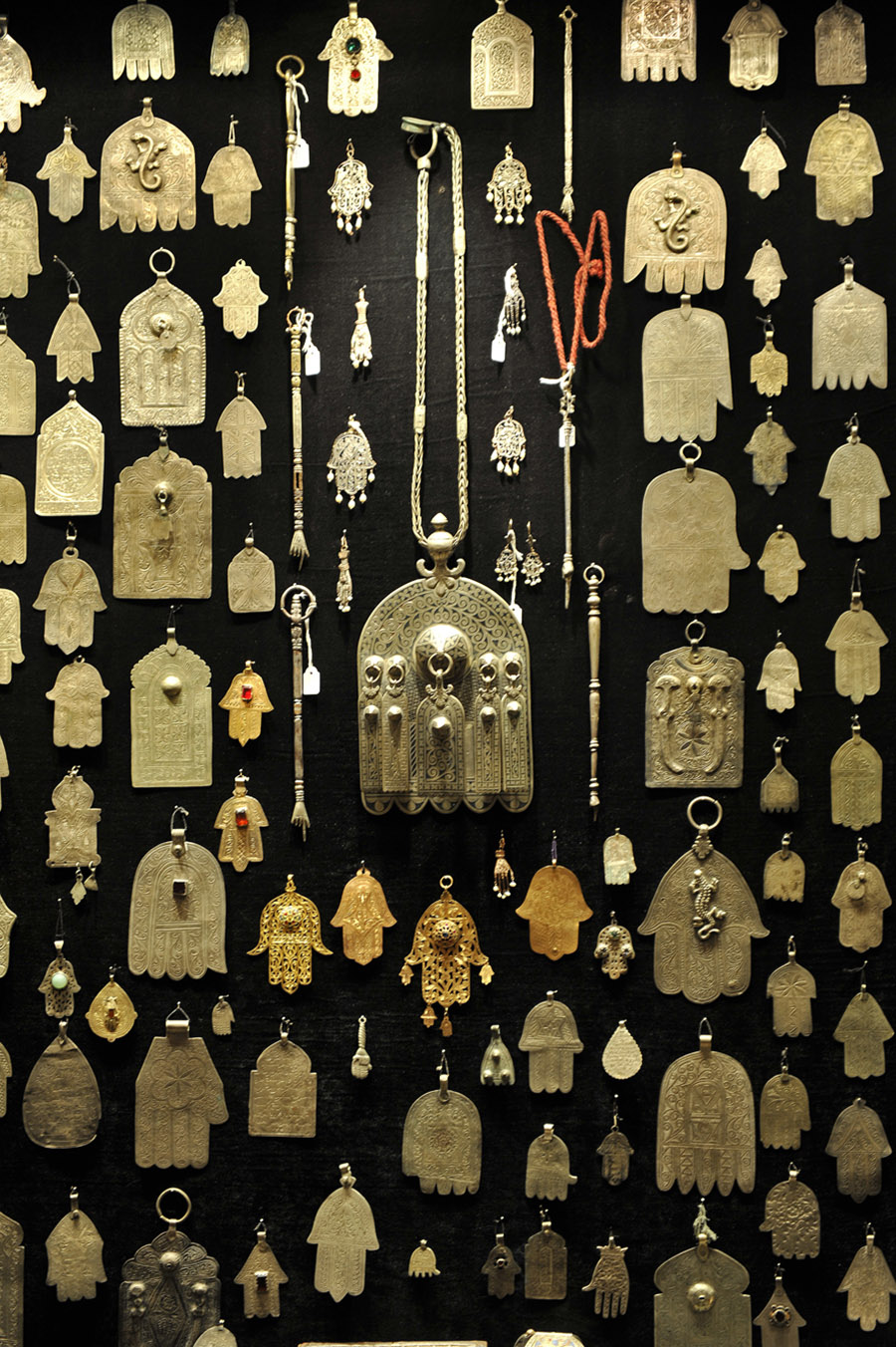 Khamsa worn by both Muslims and Jews for protection against the evil eye, 2011