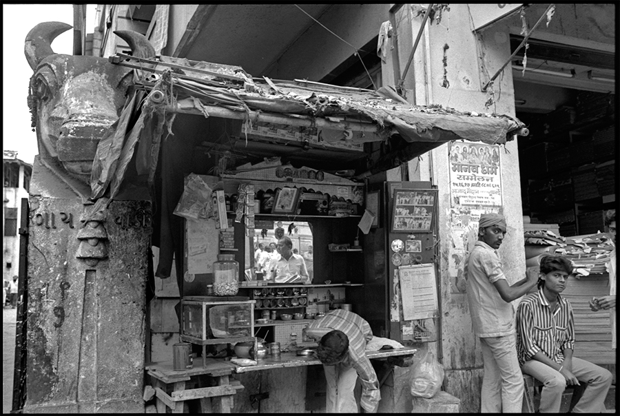 Betel nut stall and ear cleaner, Bombay, 1988